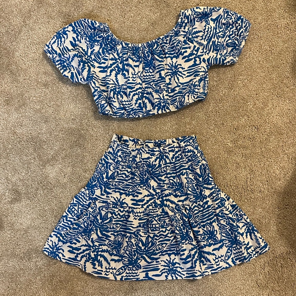 Zara matching set: top (size 8), skirt (size 9).